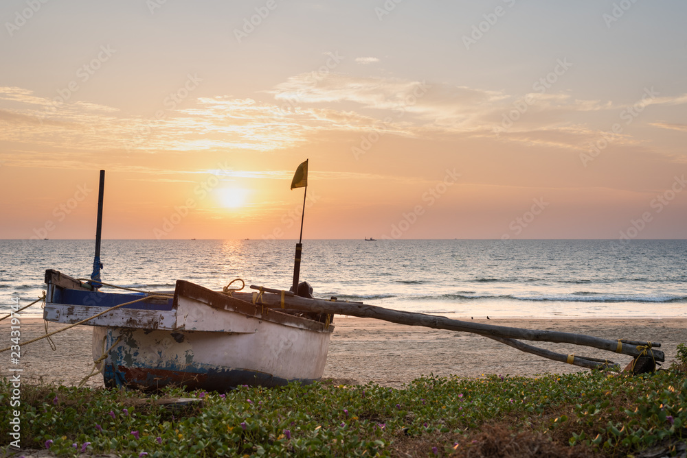 Local beach shacks and relaxation zones at Sernabatim Beach in Goa India