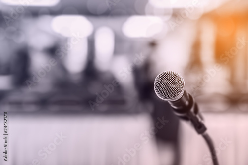 Blurred and Soft focus of head microphone on stage of Education meeting or event whit blurred background,Education meeting and event on stage concept and copy space © miraclebuggy