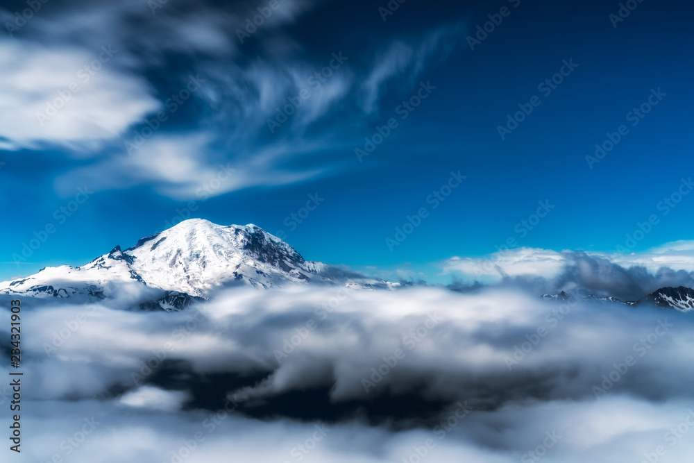 Obraz premium whimsical mountain peak in the clouds