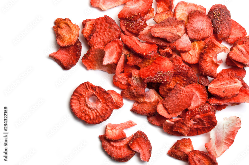Sliced dried strawberries isolated on white Sliced dried strawberries isolated on white
