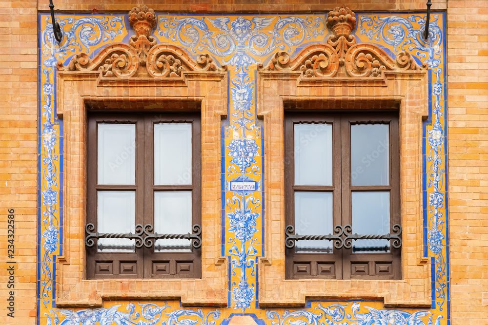 windows at a historical building in Seville, Spain