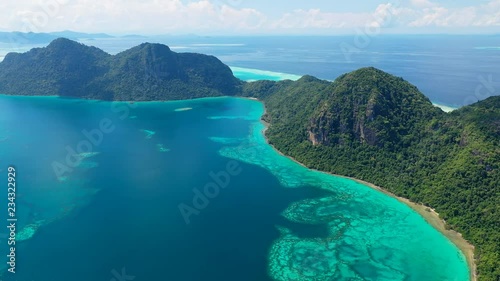 Aerial panoramic view of Pulau Bodgaya / Bohey Dulang Islands, turquoise crystal clear waters, beautiful lagoons and coral reefs of Celebes Sea - landscape panorama of Borneo, Malaysia, Pacific Ocean