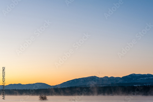 Morning mist at sunrise at the Comox estuary, Comox Valley, British Columbia