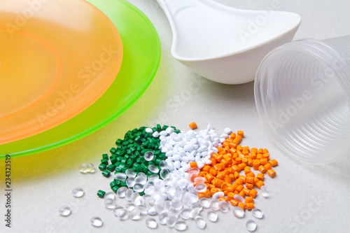Polyethylene granules and disposable tableware made of polyethylene, polypropylene. BPA FREE photo