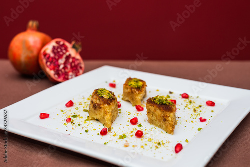 Namoura or Basbousa, a syrup soaked arabic semolina cake  photo