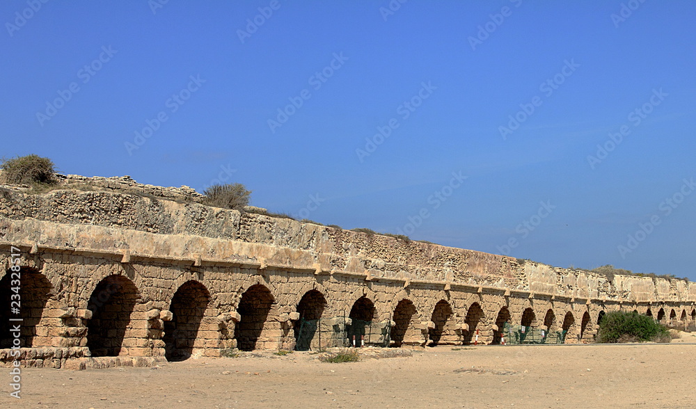 View of the ancient Roman aqueduct in Caesarea, Israel