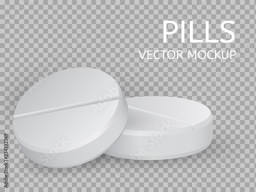 Two round pills close-up lying on top of each other
