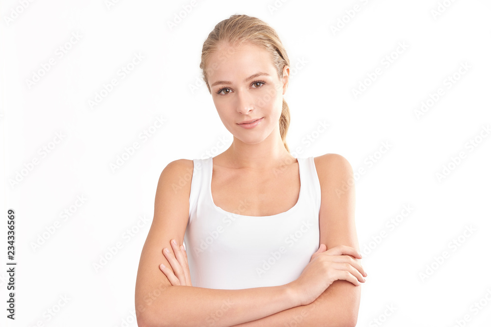 Young woman with beautiful face standing at isolated white background. Beauty shot. Young woman with beautiful face standing at isolated white background. Beauty shot.