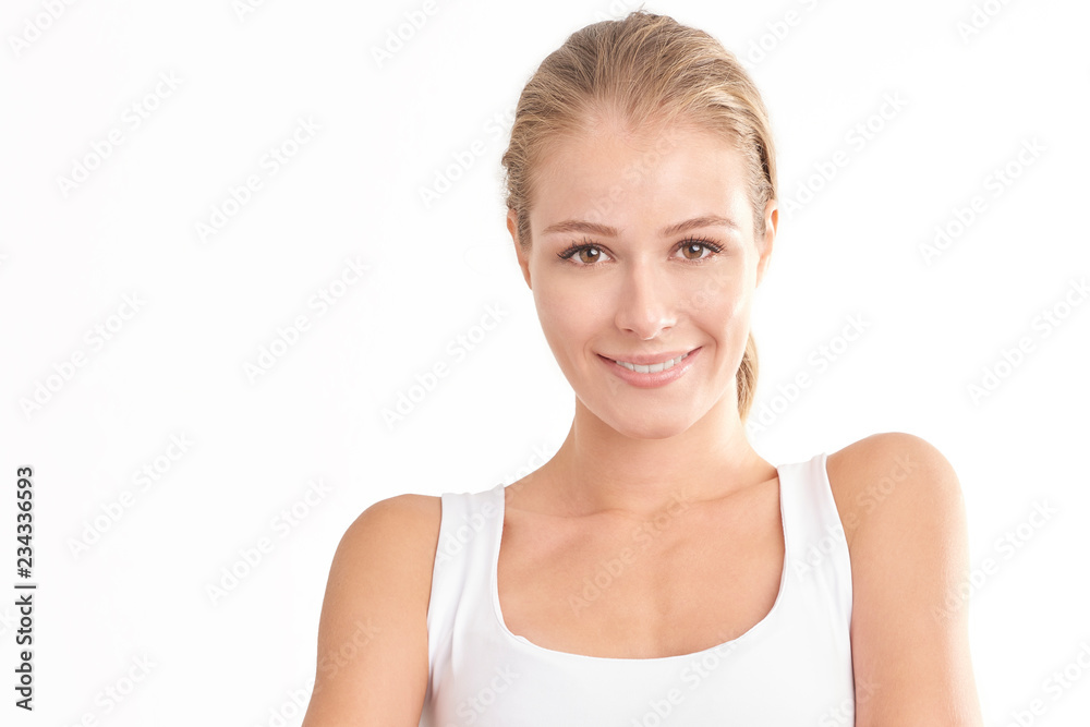 Young woman with beautiful face standing at isolated white background. Beauty shot. Young woman with beautiful face standing at isolated white background. Beauty shot.