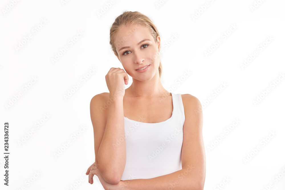 Young woman with beautiful face standing at isolated white background. Beauty shot. Young woman with beautiful face standing at isolated white background. Beauty shot.