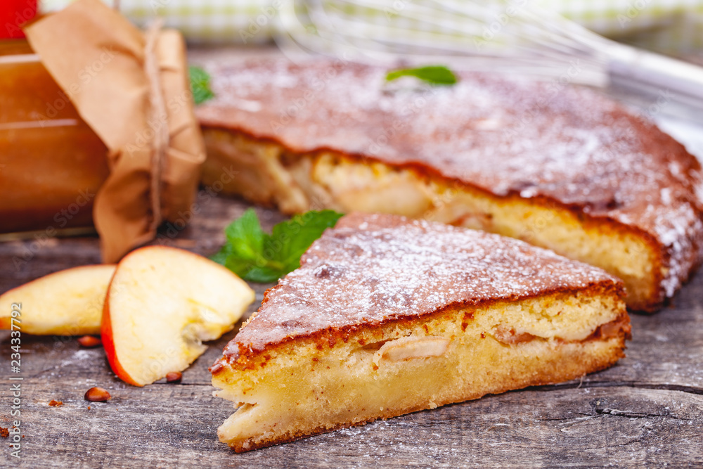 Pie with apple and pear on wooden rustic table. Close up Pie with apple and pear on wooden rustic table. Close up