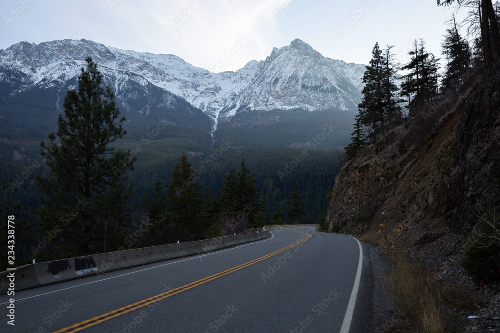 British Columbia Canada sea to sky highway road with snowy mountain in background British Columbia Canada sea to sky highway road with snowy mountain in background