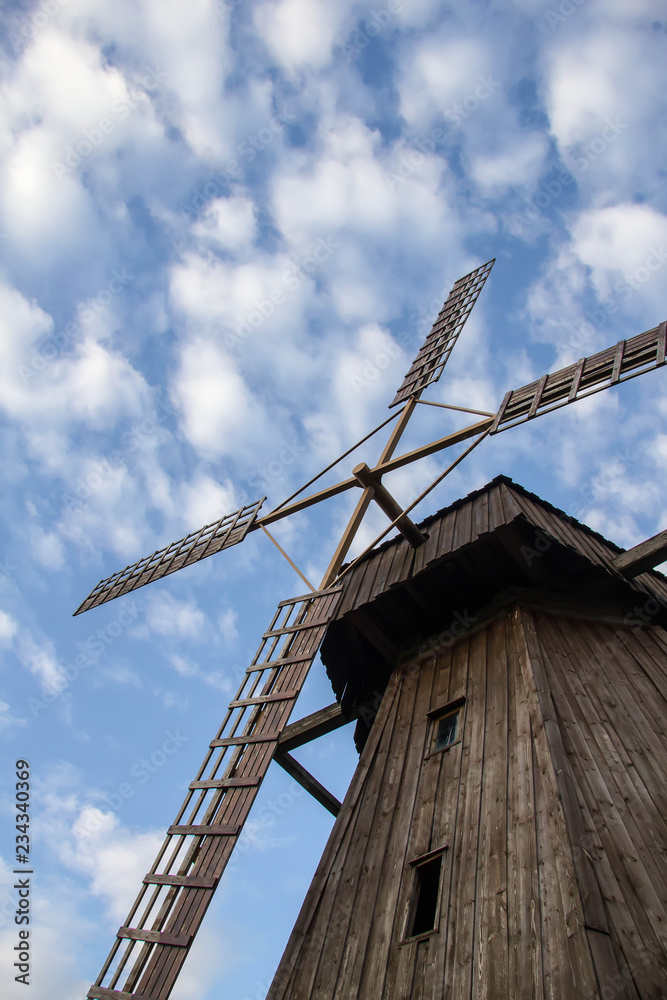 old windmill and blue sky