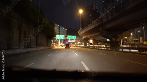 Driving time lapse POV night in Kuala Lumpur city. LDP Highway. Lebuhraya Damansara Puchong photo