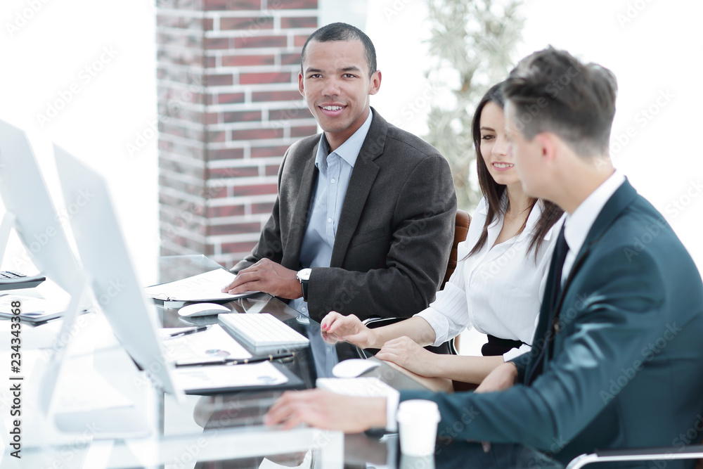 employees discussing new ideas in the workplace in the office.