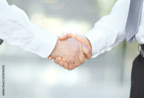 closeup. handshake of business partners on blurred background.