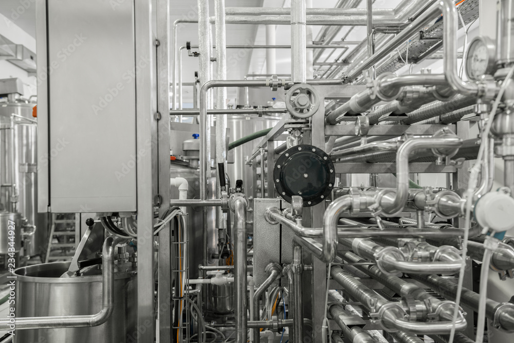 measurement sensors and pipes in the factory. equipment at the dairy plant measurement sensors and pipes in the factory. equipment at the dairy plant
