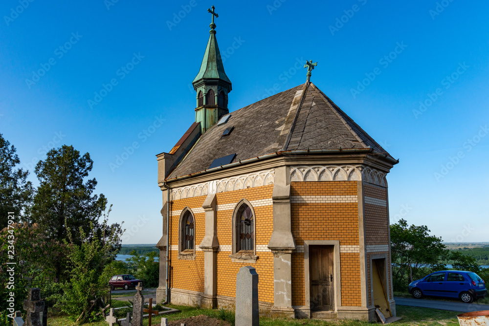 Fototapeta premium Sremski Karlovci, Serbia - May 2, 2018: Capel of St. Jacob's Apostle on local cemetery in Sremski Karlovci, Serbia.