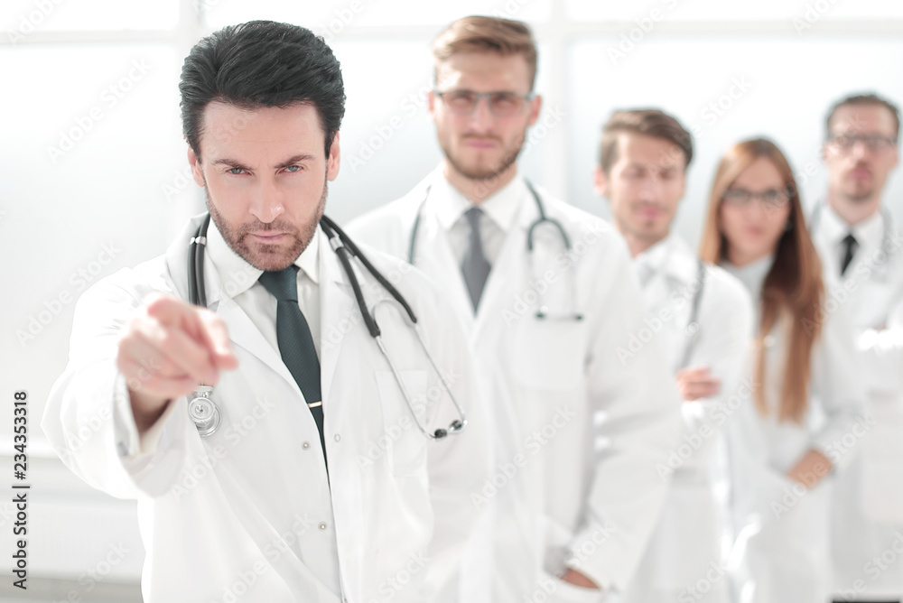 strict doctor, pointing at you, standing in the workplace strict doctor, pointing at you, standing in the workplace
