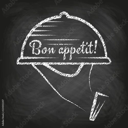 'Bon appetit' concept - hand carrying a tray with a food dome, chalkboard background