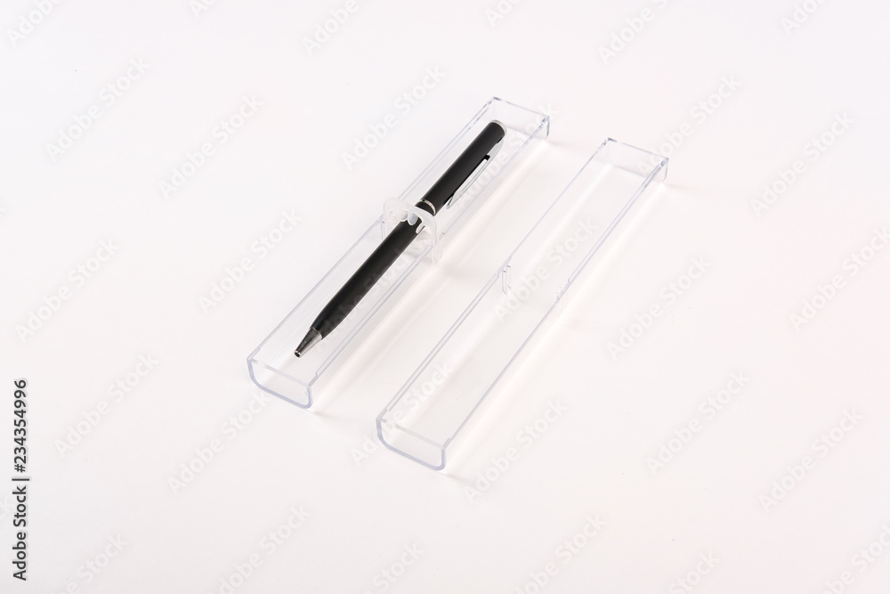 Black luxury pen in a transparent glass case on a white isolated background Black luxury pen in a transparent glass case on a white isolated background