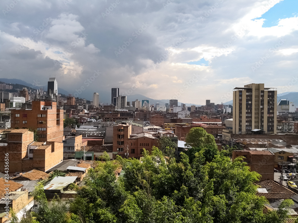 View of the center of Medellin, Colombia with high buildings of industry, commerce and finance. Partly cloudy day. View of the center of Medellin, Colombia with high buildings of industry, commerce and finance. Partly cloudy day.