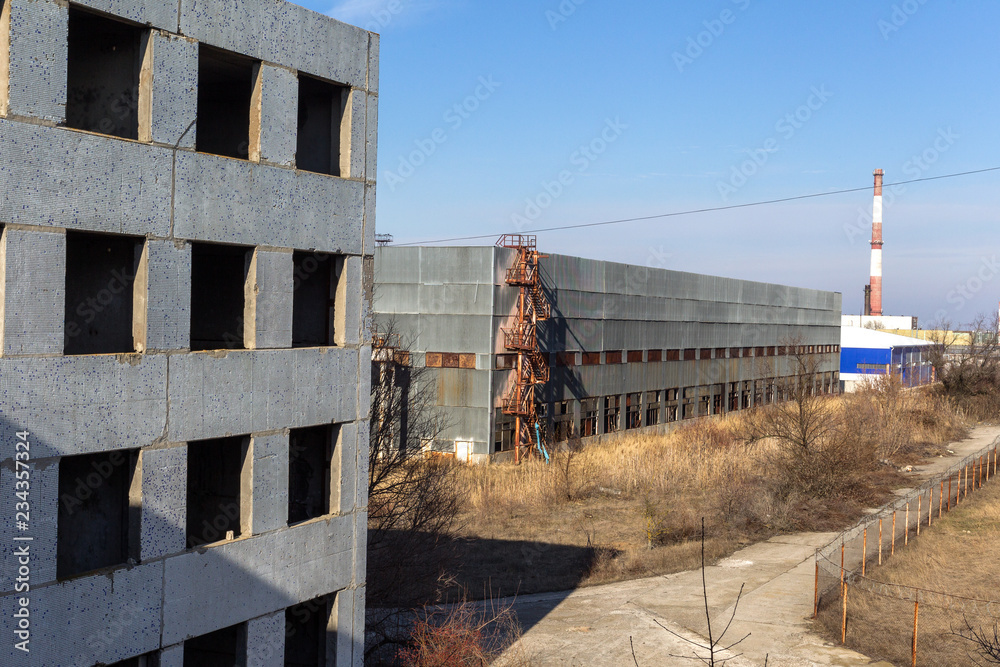 Corps of an old abandoned industrial plant. Abandoned construction of a nuclear power plant in Odessa, Teplodar. Industrial unnecessary object since the USSR