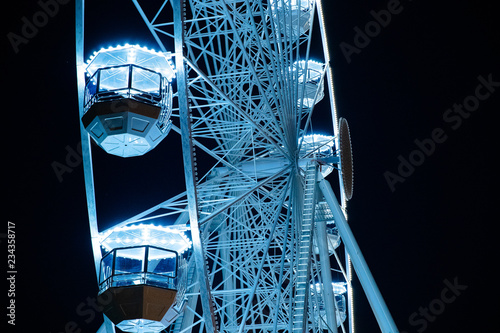 Biggest Ferris wheel in Brno, Czech Republic in Moravske square during set up for Christmas event captured at night time