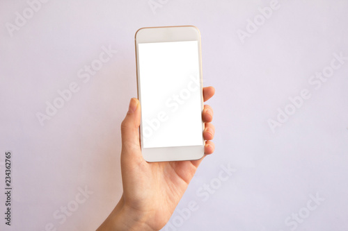 hand holding mobile phone with isolated background