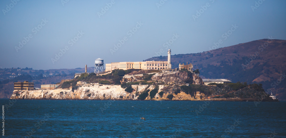 Naklejka premium View of Alcatraz Island with famous prison in San Francisco Bay Area, California, United States, summer sunny day