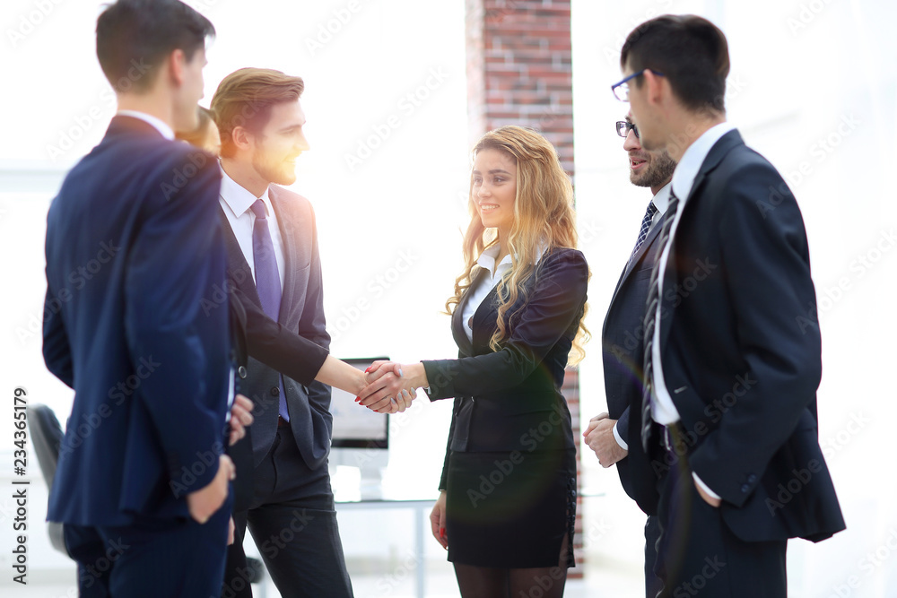 handshake of two business women in the office handshake of two business women in the office