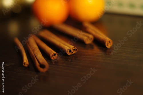 Cinamon bark sticks with citrus in background
