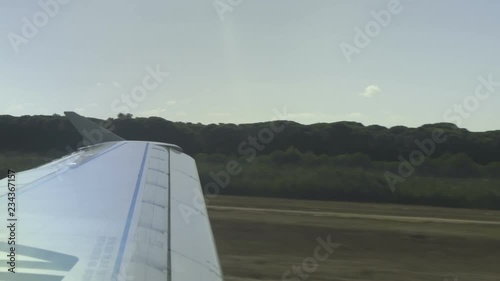 Airplane Wing on the Runway photo
