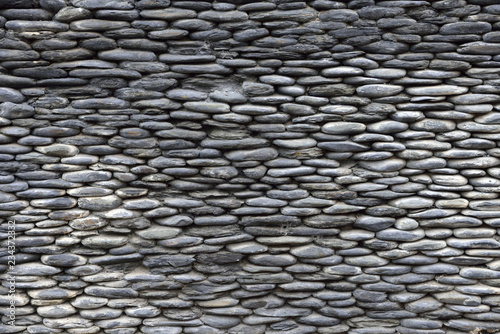 Rough stone wall texture.