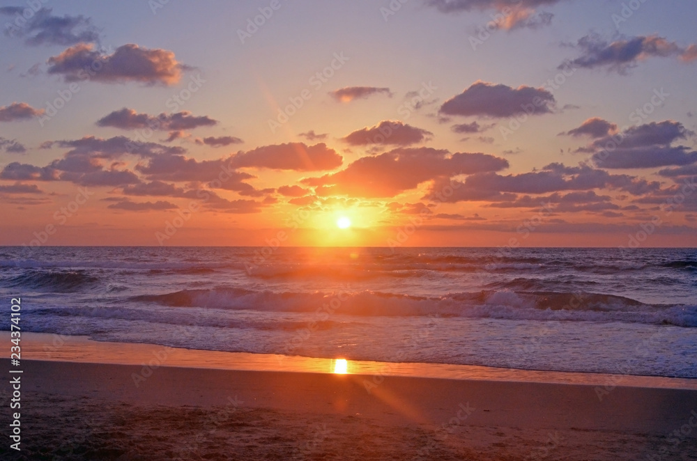 A magical wonderful sunset on the shores of the Mediterranean in Israel, Tel Aviv..