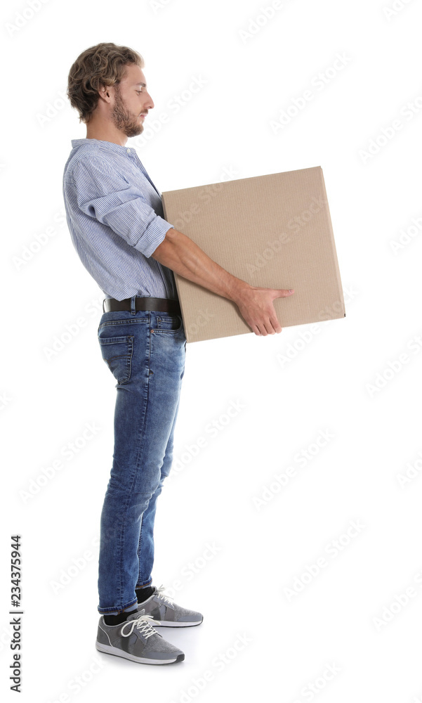 Full length portrait of young man carrying heavy cardboard box on white background. Posture concept Full length portrait of young man carrying heavy cardboard box on white background. Posture concept