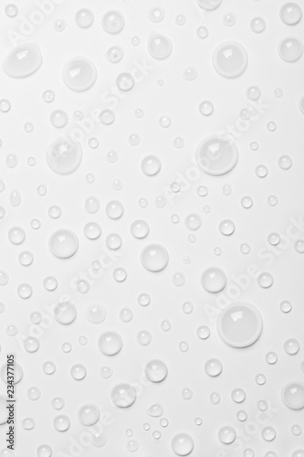 Fototapeta Naklejka Na Ścianę i Meble -  Water drops on white background, top view