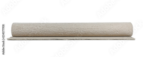 Fotografie Rolled soft carpet on white background. Interior element