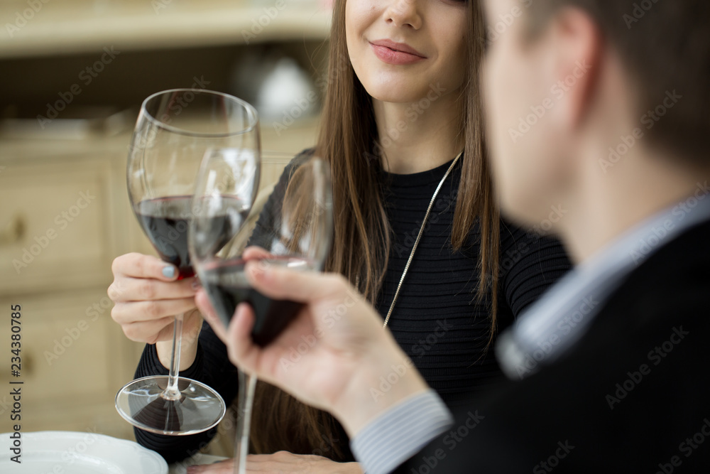 Couple toasting wineglasses Couple toasting wineglasses