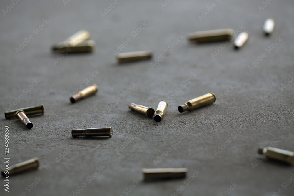 Empty bullets on the ground Empty bullets on the ground