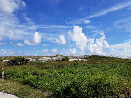 sandy beach with clouds