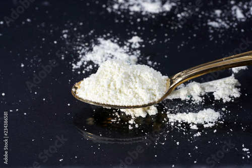 Chemical powder from the chemistry kit with macro lens photographed in studio