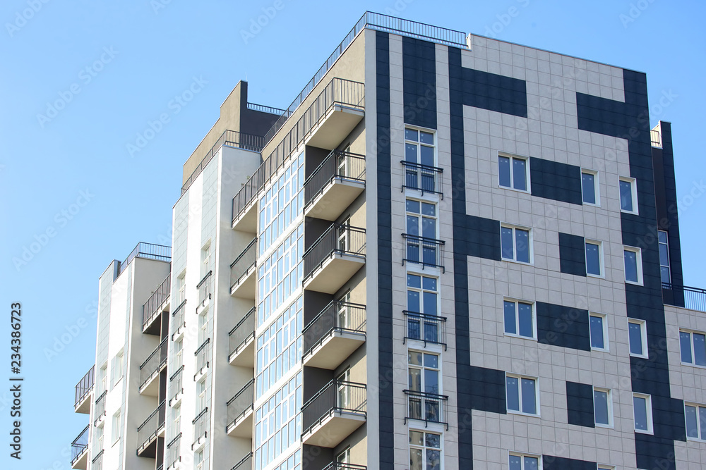 Fototapeta premium newly built multi-storey residential building