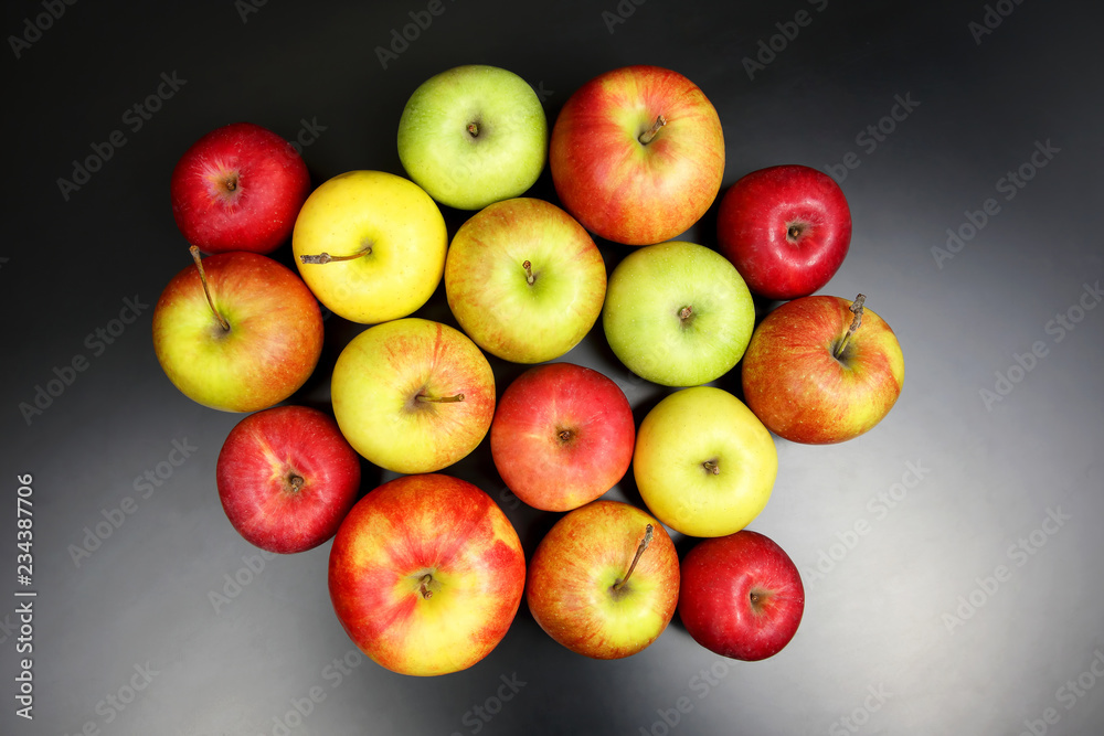 fresh different apples on dark background fresh different apples on dark background