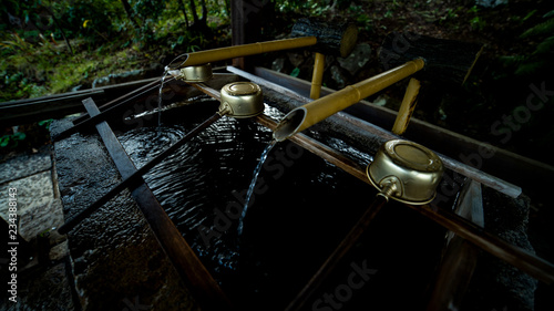 Photography A structure in a shinto shrine called 'temizuya' in Japan