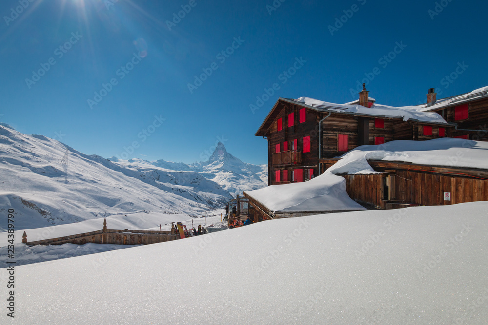 Naklejka premium Hotel and mountain restaurant Fluhalp with Matterhorn, Zermatt, Switzerland.