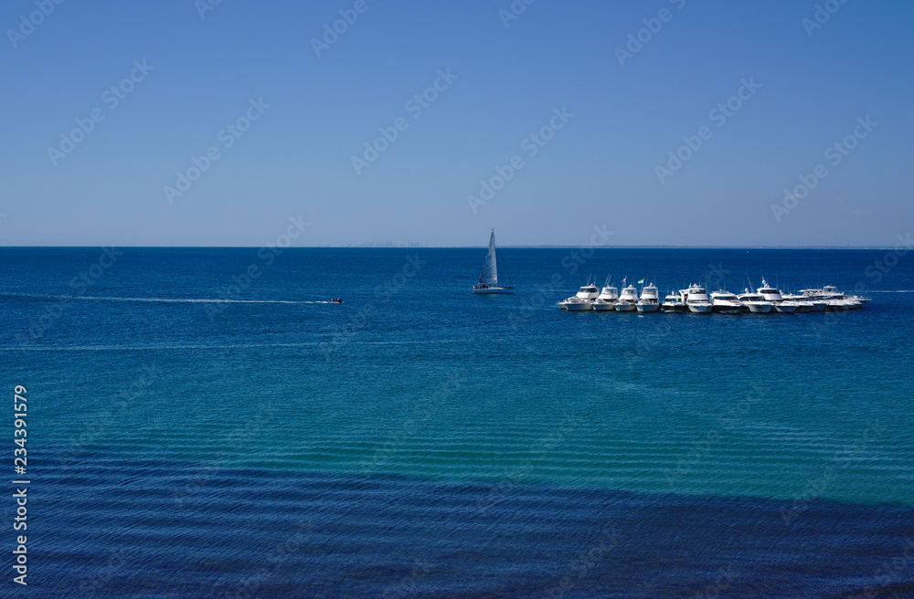 Boats on sea with blue sky background