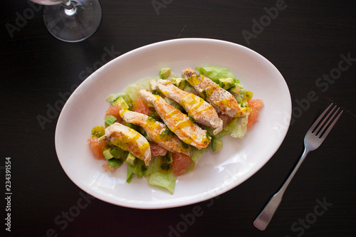 healthy Chicken salad served on a white plate