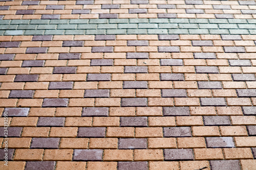 Wallpaper Mural pattern of brick wall on paving floor near playground in park Torontodigital.ca