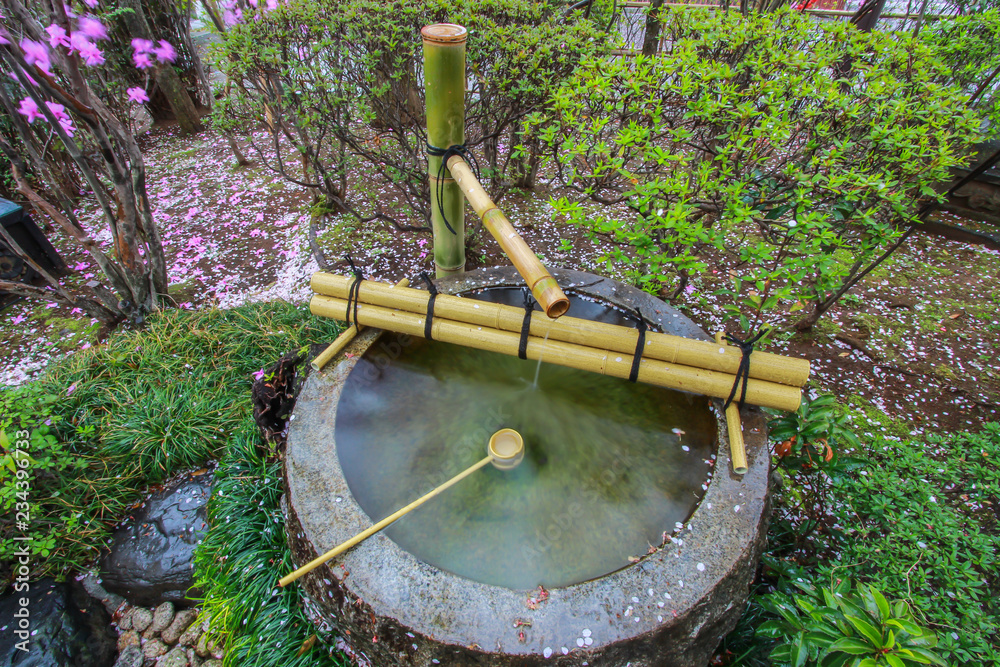 Tsukubai Water Fountain in Japanese Garden at Kitain Temple,Kosenbamachi,Kawagoe,Saitama,Japan